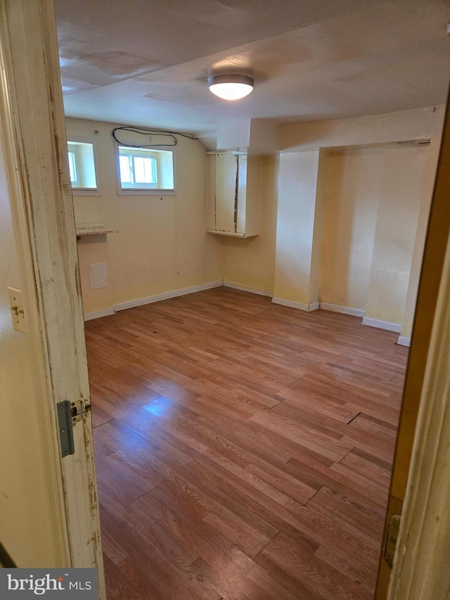 732 NW Morton St NW, Washington, DC 20010 - below grade area featuring wood finished floors and baseboards
