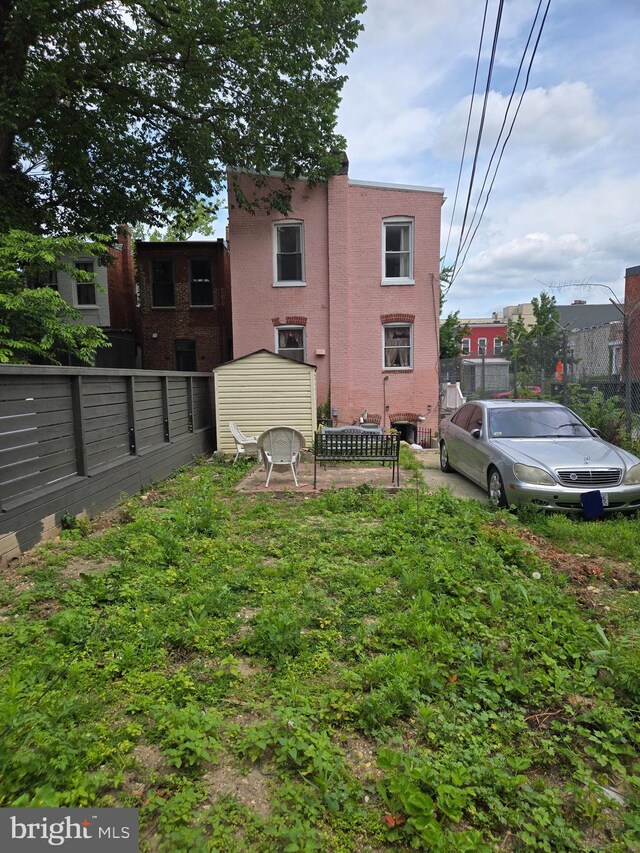 732 NW Morton St NW, Washington, DC 20010 - rear view of property with brick siding
