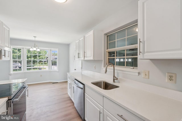 6 Flower Hill Ct, Gaithersburg, MD 20879 - kitchen with appliances with stainless steel finishes, white cabinets, and light countertops