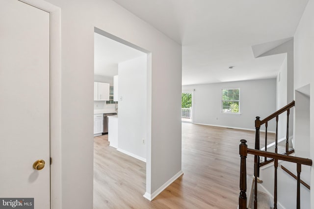 6 Flower Hill Ct, Gaithersburg, MD 20879 - hallway featuring light wood-type flooring and stairs