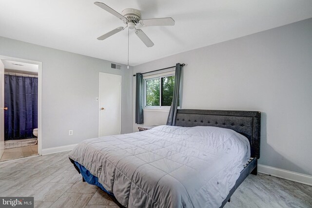 9730 Kingsbridge Dr Unit 002, Fairfax, VA 22031 - bedroom with ceiling fan and connected bathroom