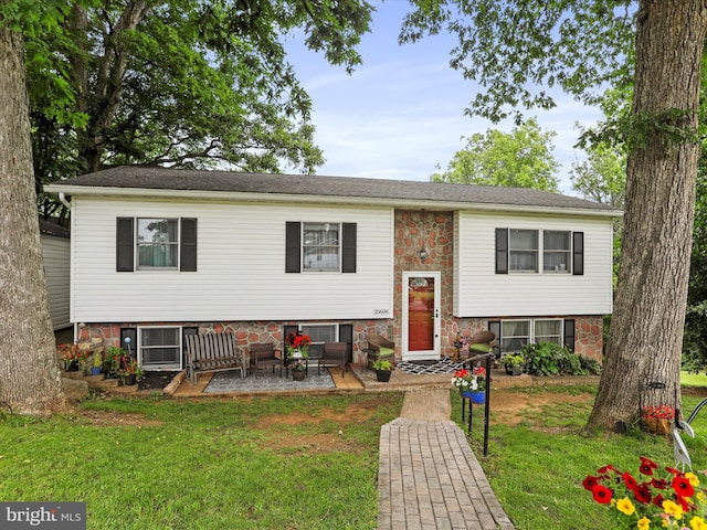 15606 Winslow St SW, Cresaptown, MD 21502 - raised ranch with outdoor lounge area, a front lawn, stone siding, and a patio