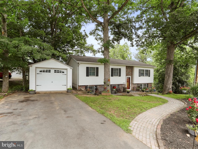 15606 Winslow St SW, Cresaptown, MD 21502 - bi-level home featuring an outdoor structure, a front lawn, a garage, and asphalt driveway