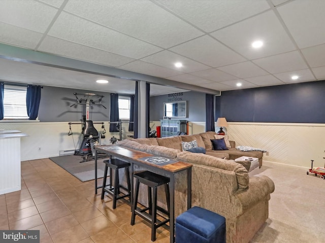 15606 Winslow St SW, Cresaptown, MD 21502 - living room featuring wainscoting, tile patterned flooring, a paneled ceiling, baseboard heating, and recessed lighting