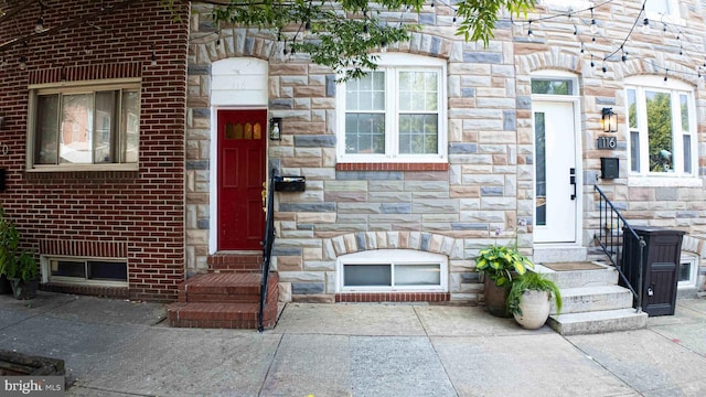 118 S Conkling St, Baltimore, MD 21224 - property entrance with stone siding