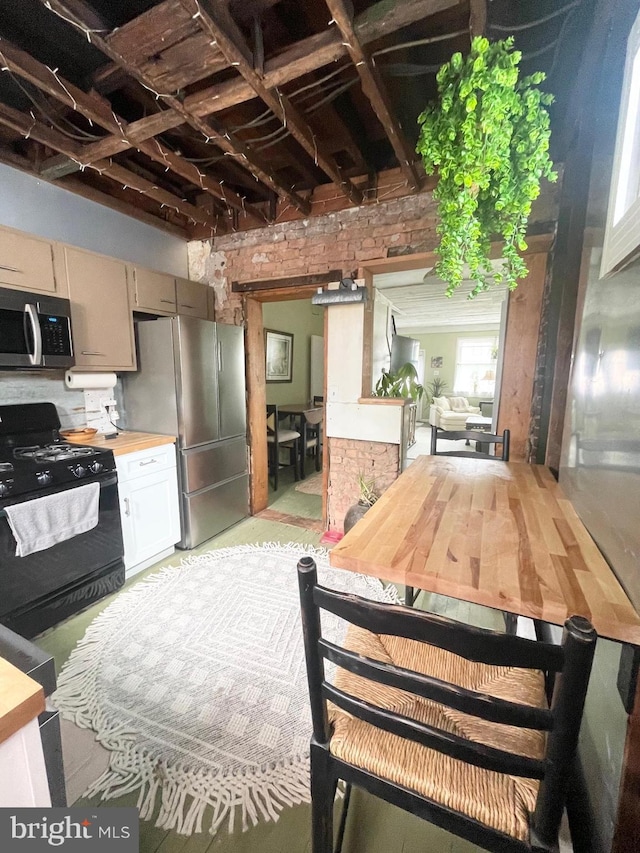3427 Livingston St, Philadelphia, PA 19134 - kitchen featuring appliances with stainless steel finishes and light countertops
