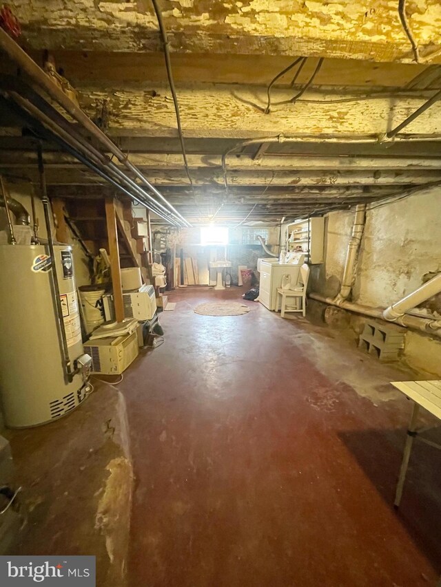 3427 Livingston St, Philadelphia, PA 19134 - unfinished basement featuring gas water heater