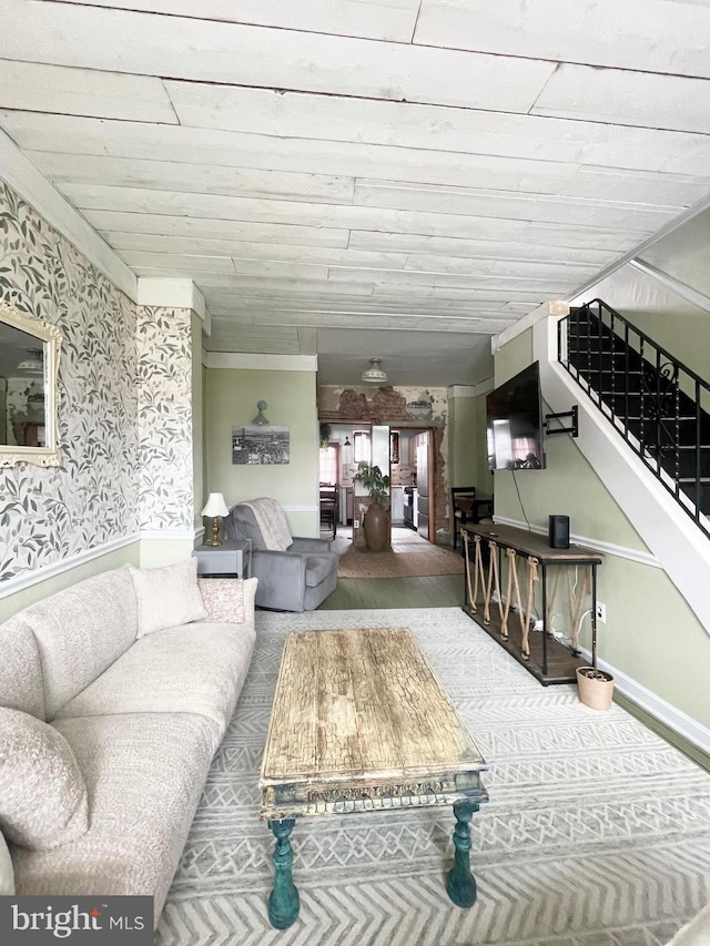 3427 Livingston St, Philadelphia, PA 19134 - living area with stairs and wallpapered walls