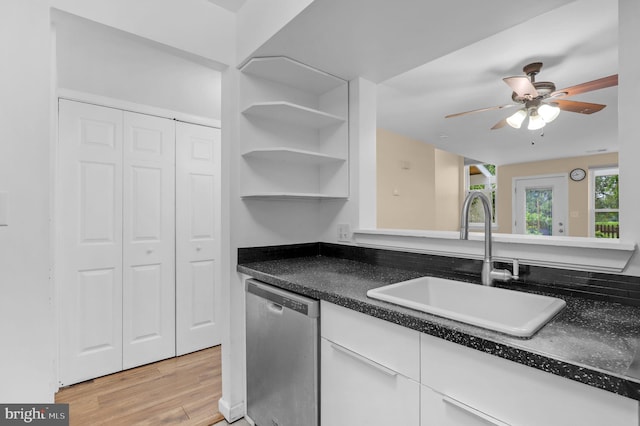 11920 Roan Ln, North Potomac, MD 20878 - kitchen featuring stainless steel dishwasher, dark countertops, a ceiling fan, and white cabinets
