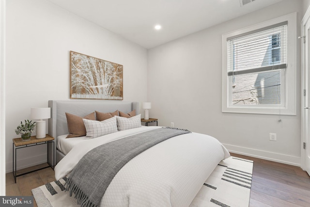 417 4th St SE Unit 2, Washington, DC 20003 - bedroom with wood finished floors and recessed lighting