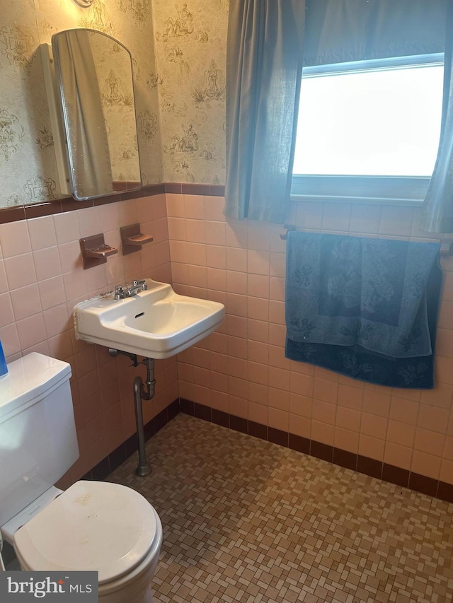 3532 Primrose Rd, Philadelphia, PA 19114 - bathroom featuring wallpapered walls, wainscoting, and tile walls