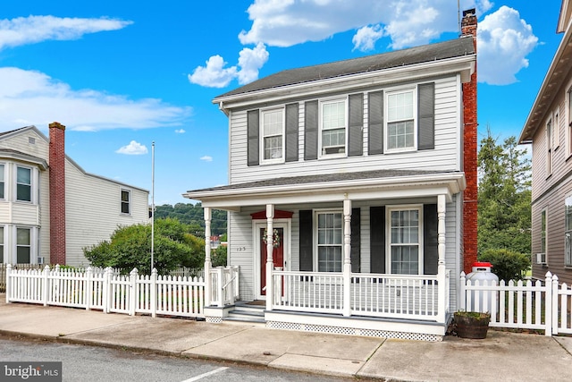 123 N 2nd St, Newport, PA 17074 - view of front of home featuring a porch and a chimney