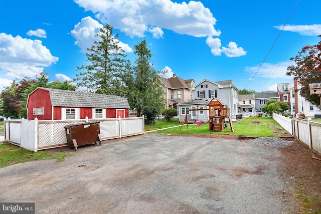 123 N 2nd St, Newport, PA 17074 - view of front of property featuring a gambrel roof, a storage shed, and a playground