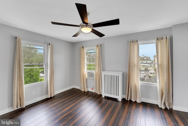 211 Penn St, Ridley Park, PA 19078 - unfurnished room featuring radiator heating unit, wood finished floors, and ceiling fan