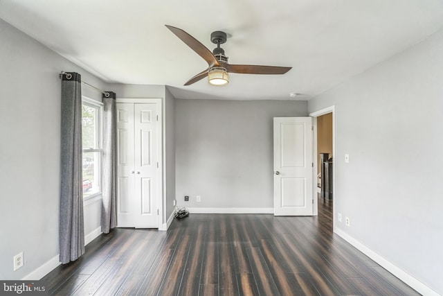 211 Penn St, Ridley Park, PA 19078 - unfurnished bedroom with dark wood-style flooring, a closet, and ceiling fan