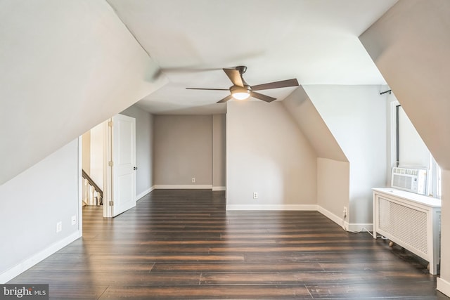 211 Penn St, Ridley Park, PA 19078 - bonus room featuring ceiling fan, radiator, dark wood-type flooring, and vaulted ceiling