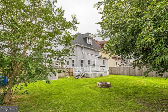 211 Penn St, Ridley Park, PA 19078 - fenced backyard featuring an outdoor fire pit and a wooden deck