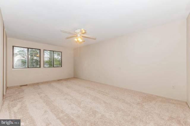 7617 Seven Mile Ln, Baltimore, MD 21208 - unfurnished room featuring carpet floors and a ceiling fan