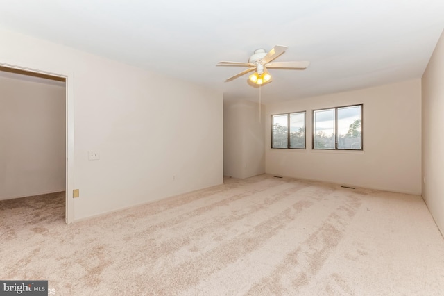7617 Seven Mile Ln, Baltimore, MD 21208 - carpeted spare room featuring a ceiling fan