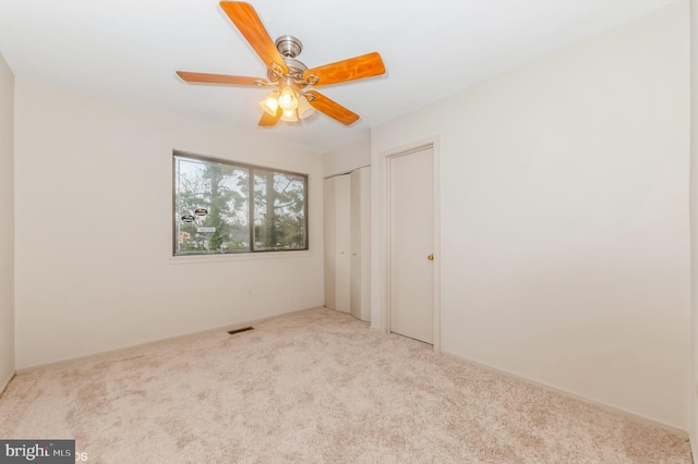 7617 Seven Mile Ln, Baltimore, MD 21208 - unfurnished bedroom with carpet floors and two closets
