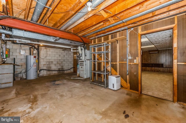 7617 Seven Mile Ln, Baltimore, MD 21208 - unfinished basement featuring water heater, concrete block wall, and heating unit