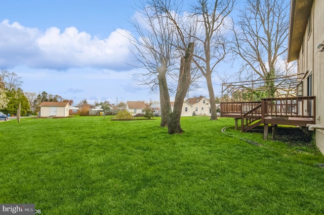 7617 Seven Mile Ln, Baltimore, MD 21208 - view of grassy yard featuring a deck and a residential view