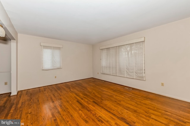 7617 Seven Mile Ln, Baltimore, MD 21208 - unfurnished room featuring wood finished floors