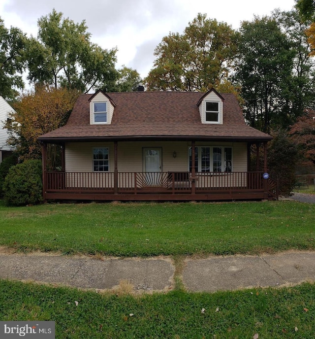 16 Tollgate Rd, Owings Mills, MD 21117 - view of front of house with a front lawn, covered porch, and a shingled roof