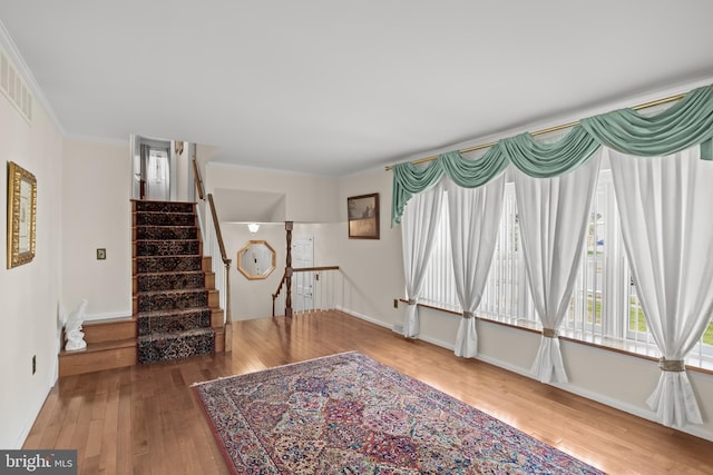 177 Antietam Rd, Delran, NJ 08075 - living room featuring wood finished floors, ornamental molding, and stairs