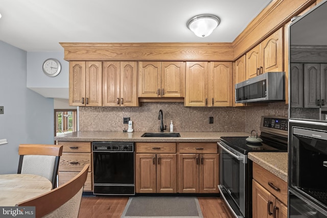 177 Antietam Rd, Delran, NJ 08075 - kitchen with black appliances, backsplash, dark wood-type flooring, and light countertops