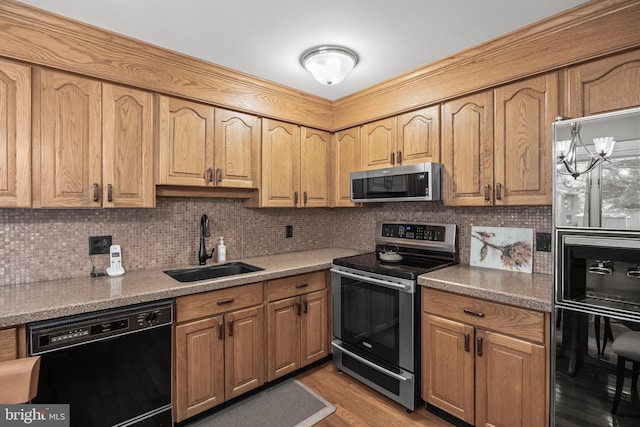 177 Antietam Rd, Delran, NJ 08075 - kitchen with stainless steel appliances, decorative backsplash, light countertops, light wood-type flooring, and beverage cooler