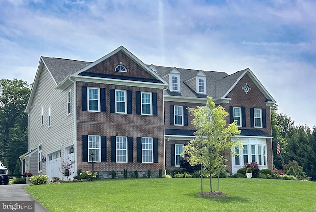 20524 Stone Fox Ct, Leesburg, VA 20175 - colonial-style house featuring a front yard and brick siding