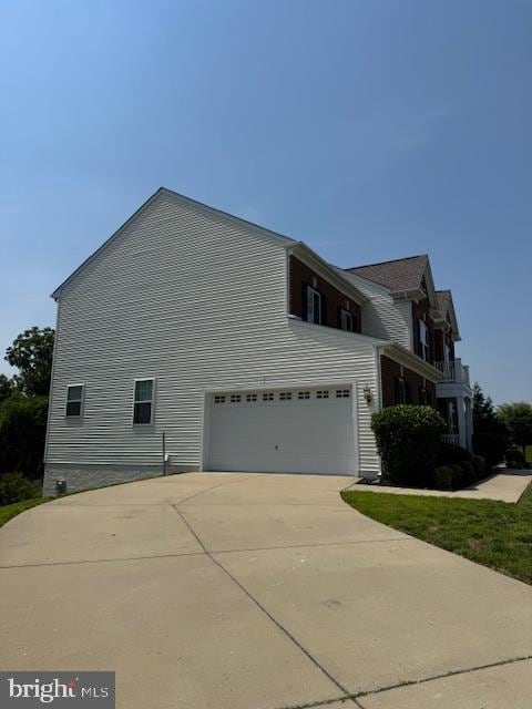 12701 Coventry Manor Way, Upper Marlboro, MD 20772 - view of property exterior featuring an attached garage and driveway