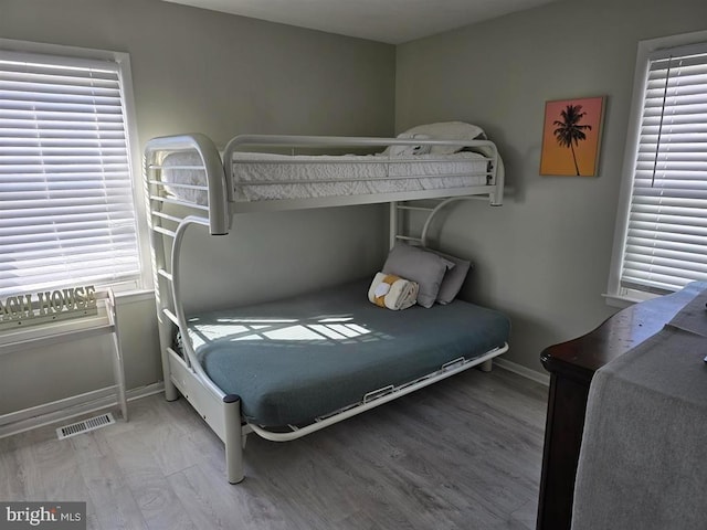 3 Lighthouse Cv, Brigantine, NJ 08203 - bedroom featuring light wood-style floors and multiple windows