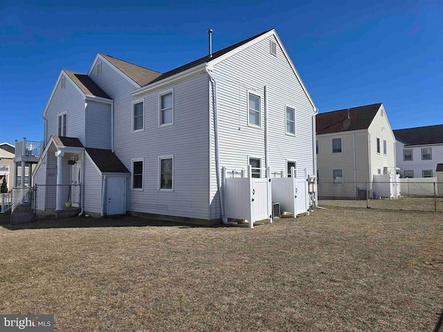 3 Lighthouse Cv, Brigantine, NJ 08203 - rear view of house with a fenced backyard and a shed