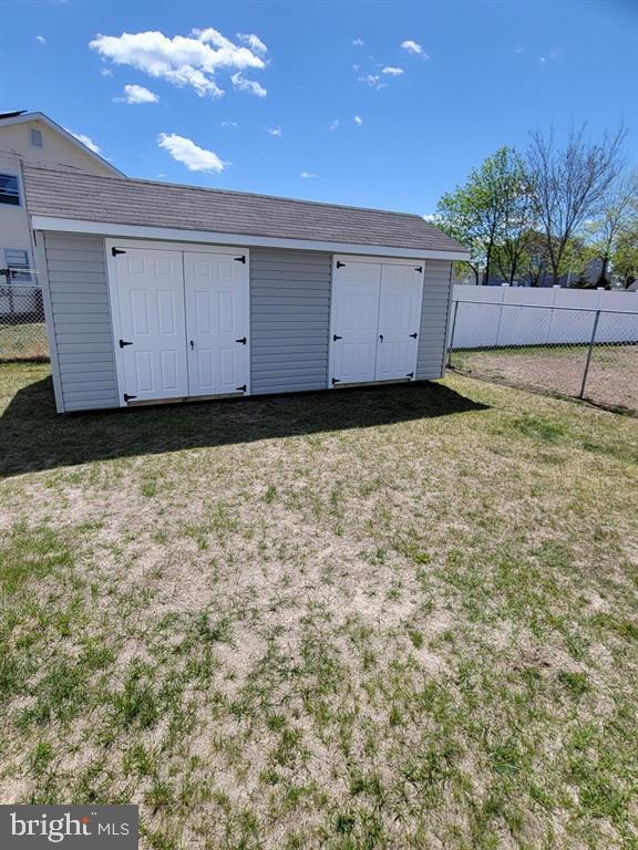 3 Lighthouse Cv, Brigantine, NJ 08203 - view of shed featuring a fenced backyard