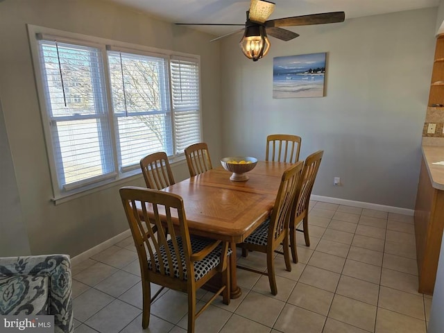 3 Lighthouse Cv, Brigantine, NJ 08203 - dining area featuring light tile patterned floors, plenty of natural light, and a ceiling fan