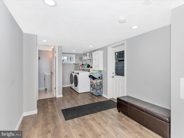 507 Kerwin Ct, Silver Spring, MD 20901 - foyer entrance featuring separate washer and dryer, light wood-type flooring, and recessed lighting