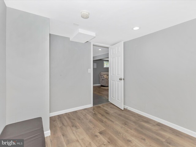 507 Kerwin Ct, Silver Spring, MD 20901 - unfurnished room with a smoke detector, recessed lighting, and wood finished floors