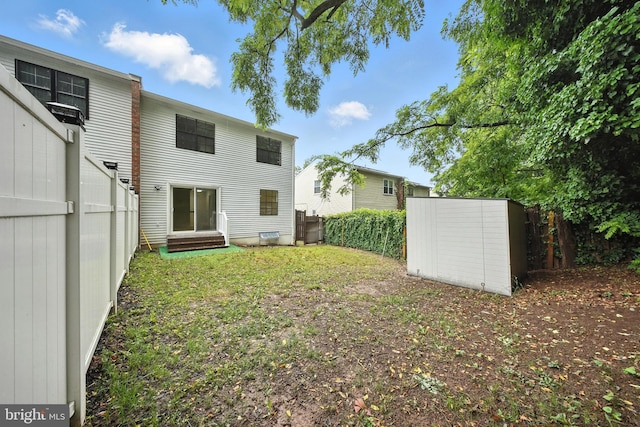 4362 Varnum Pl NE, Washington, DC 20017 - back of property featuring entry steps, a fenced backyard, and a shed