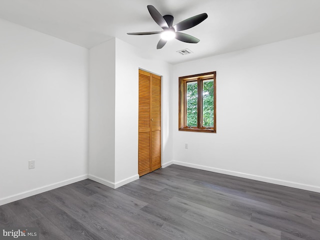 261 W Chestnut Hill Rd, Newark, DE 19713 - unfurnished bedroom featuring a closet, dark wood-type flooring, and a ceiling fan