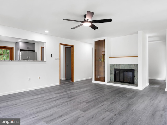 261 W Chestnut Hill Rd, Newark, DE 19713 - unfurnished living room with ceiling fan, wood finished floors, a fireplace, and recessed lighting