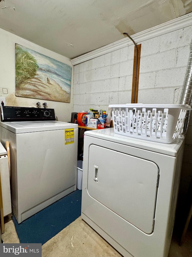 4146 Ferrara Ter, Woodbridge, VA 22193 - laundry room with separate washer and dryer and concrete block wall