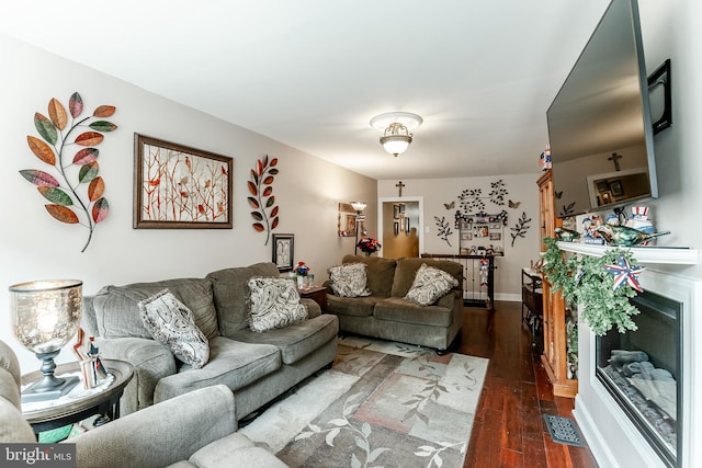 1512 S 2nd St, Philadelphia, PA 19147 - living room with dark wood-style flooring and baseboards