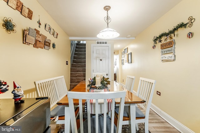 1512 S 2nd St, Philadelphia, PA 19147 - dining space featuring light wood-style flooring and stairs