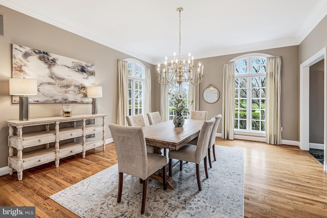 14000 Crossland Ln, Gaithersburg, MD 20878 - dining space featuring crown molding, a chandelier, and wood finished floors