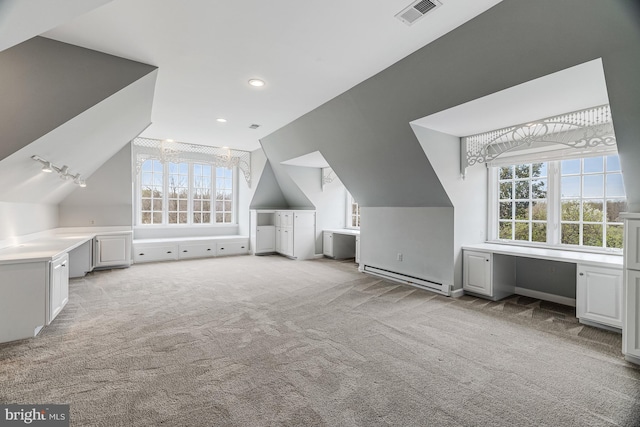 14000 Crossland Ln, Gaithersburg, MD 20878 - additional living space with baseboard heating, light carpet, healthy amount of natural light, vaulted ceiling, and recessed lighting