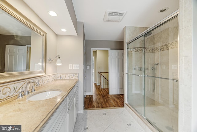 14000 Crossland Ln, Gaithersburg, MD 20878 - bathroom featuring tile patterned floors, vanity, a shower stall, and recessed lighting