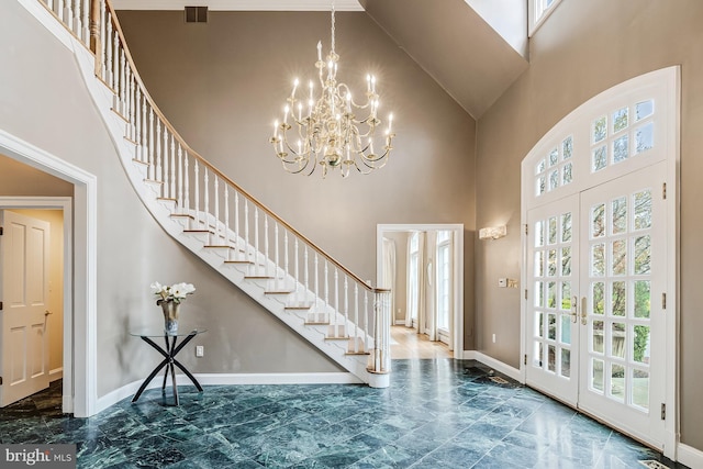 14000 Crossland Ln, Gaithersburg, MD 20878 - foyer with high vaulted ceiling, stairs, plenty of natural light, and marble finish flooring