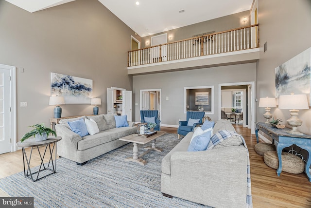 14000 Crossland Ln, Gaithersburg, MD 20878 - living room featuring a high ceiling and wood finished floors